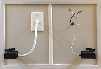 685-00157 (Wire Hide Kit; White; provides a clean, professional look for Operator and Photo Eye Installations; with wall plate, 22" of white tubing, wire nuts, dry wall anchors, and screws.)